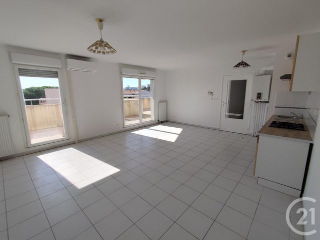 Appartement T4 à louer - 4 pièces - 83.42 m2 - NIMES - 30 - LANGUEDOC-ROUSSILLON - Century 21 Dhuoda